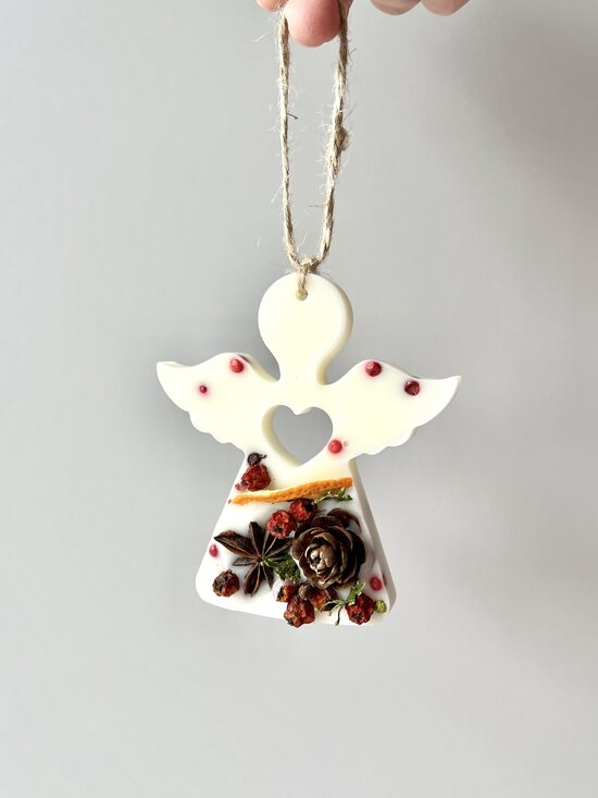 AROMAVASKA GAISA ATSVAIDZINĀTĀJS, AR KANĒĻA UN APELSĪNA SMARŽU, EŅĢELĪTIS